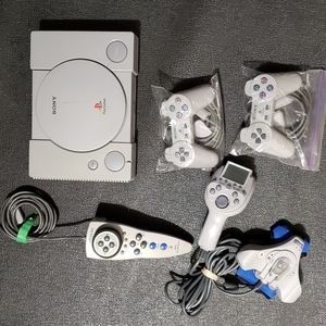 Playstation 1 with 2 rare controllers + 2 regular controllers